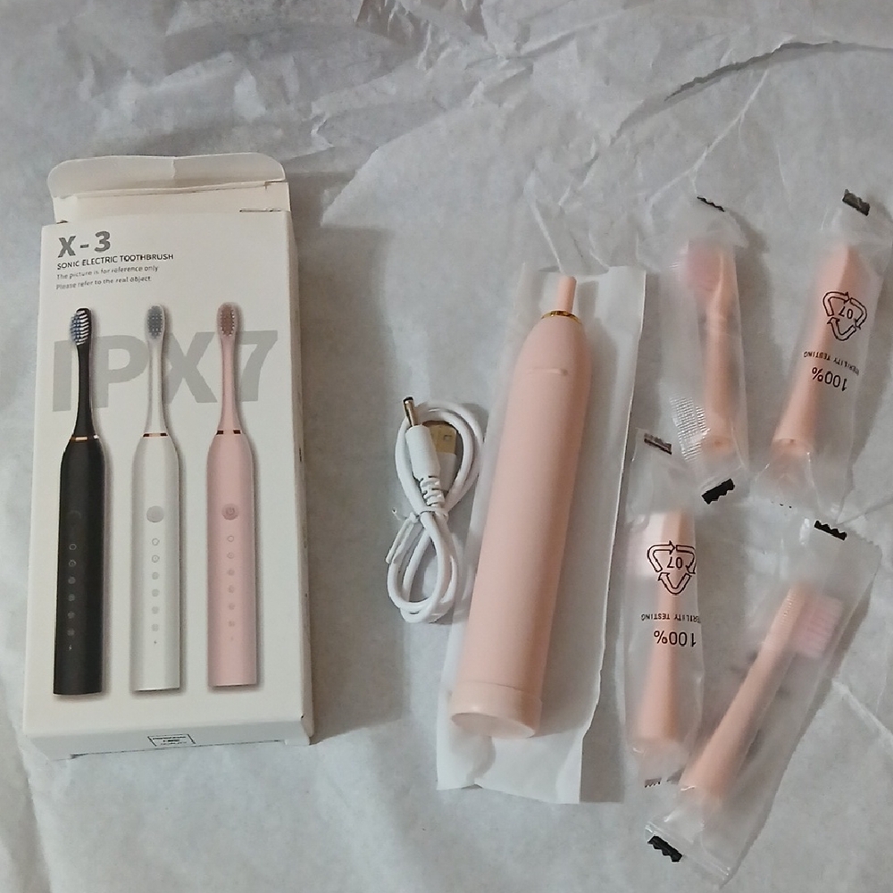 Pink Electric Toothbrush Set With 4 Brushes